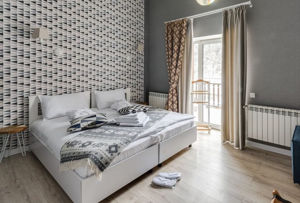 Elegant hotel room with modern design and luxurious decor elements.